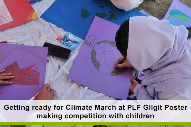 Getting ready for Climate March at PLF Gilgit Poster making competition with children 